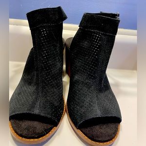 Tom’s open toed block heel sandals.